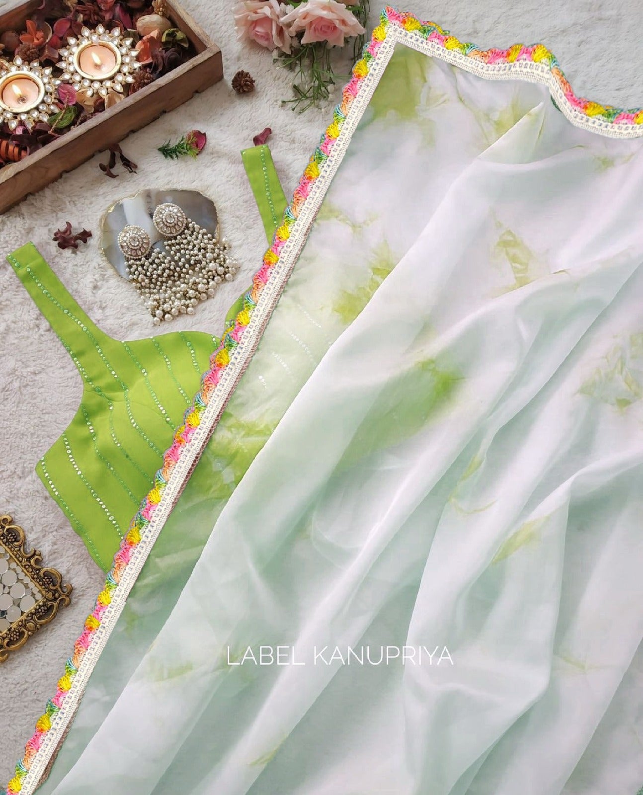 Green Organza saree with Art silk Blouse