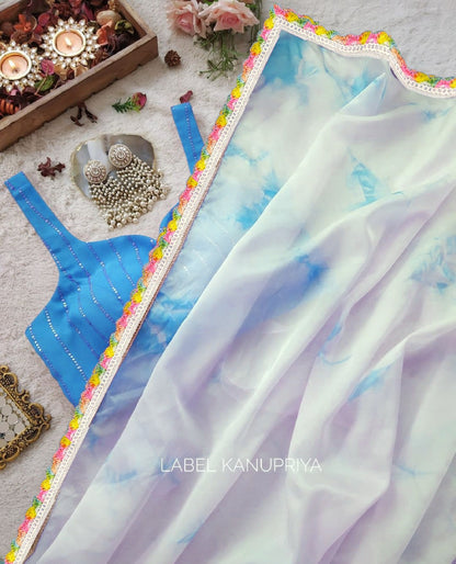 Blue Organza saree with Art silk Blouse