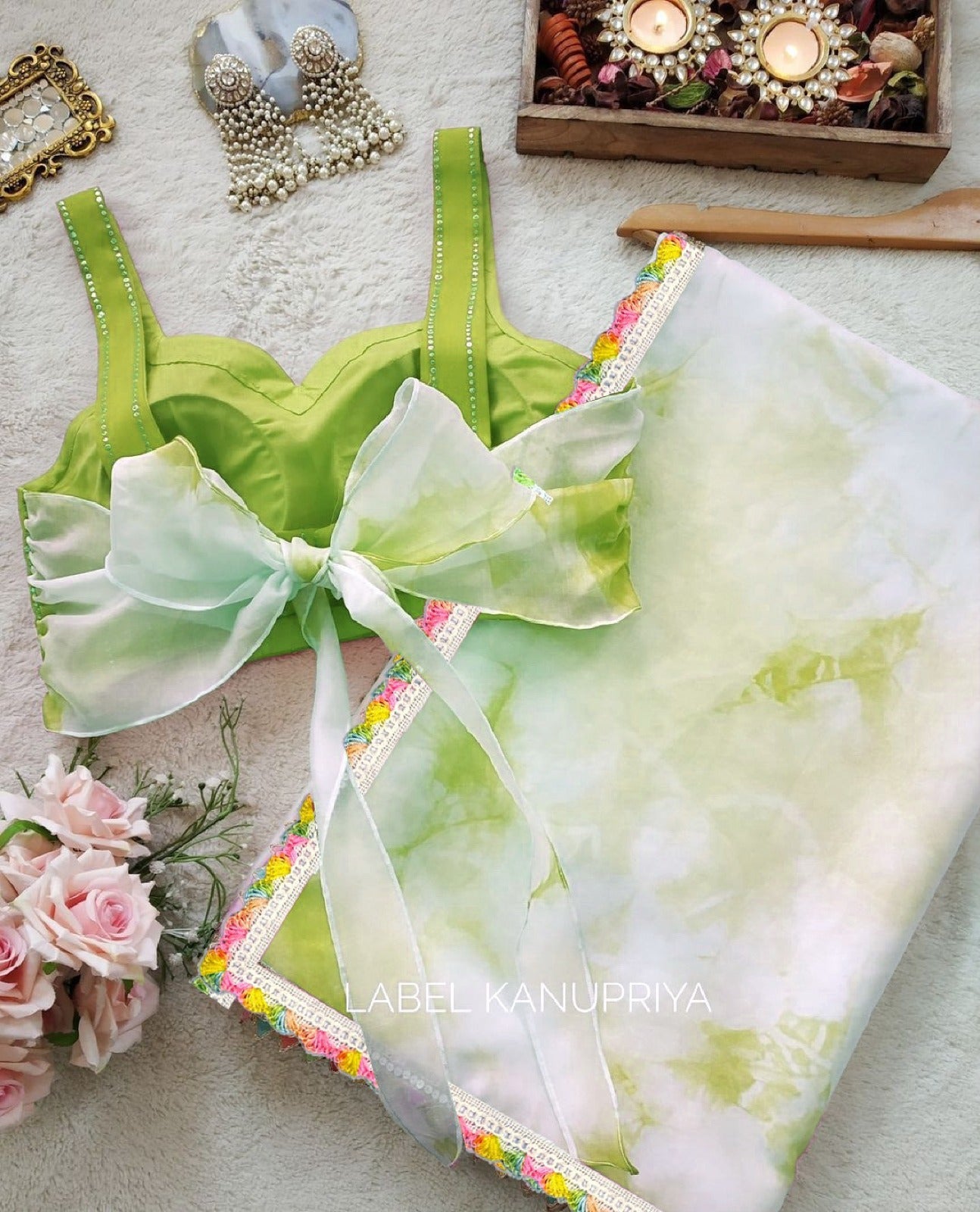 Green Organza saree with Art silk Blouse